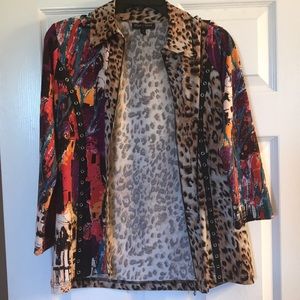 Nice lite jacket or nice blouse. Never worn.